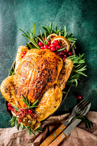 istock Roasted whole chicken with Christmas decoration 1182447848