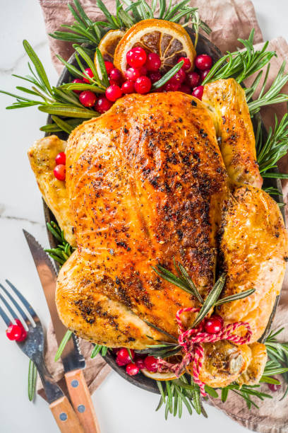 istock Roasted whole chicken with Christmas decoration 1182447862