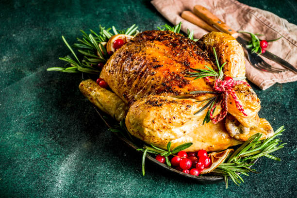 istock Roasted whole chicken with Christmas decoration 1182447864