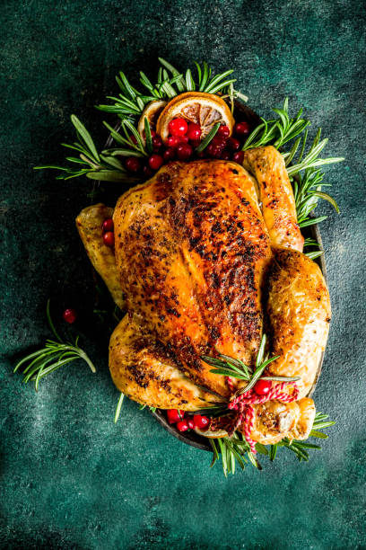 istock Roasted whole chicken with Christmas decoration 1182447962