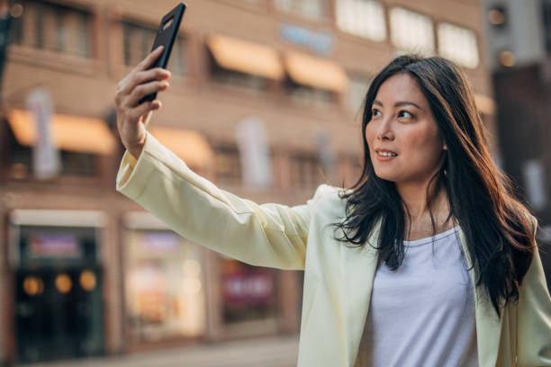istock Businesswoman taking selfie 1182451428