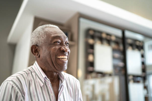 istock Happy senior man at home, looking away 1182451657