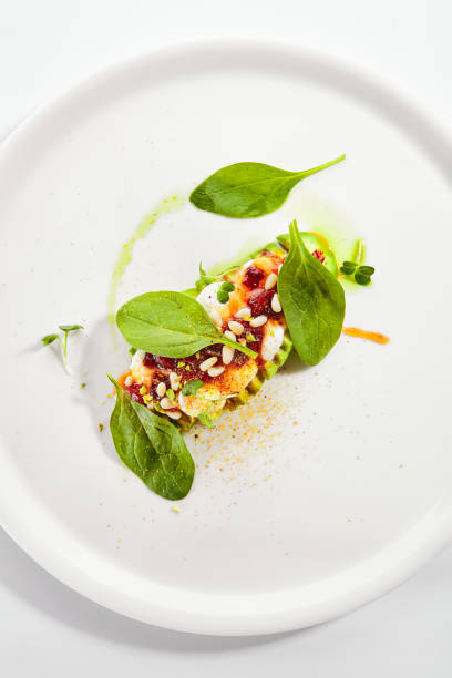 istock Avocado with Mozzarella Cream and Dried Tomato Jam 1182453004