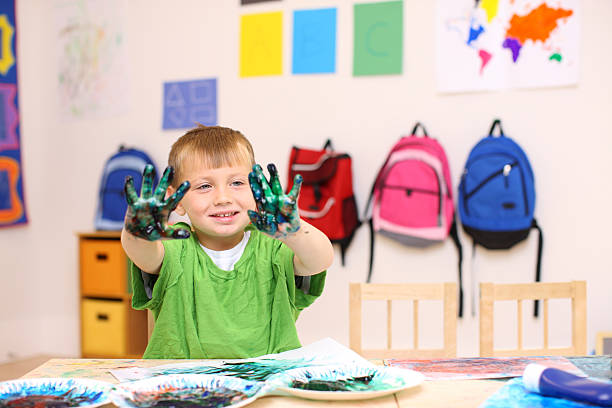 istock Preschool boy holding up hands 118245398