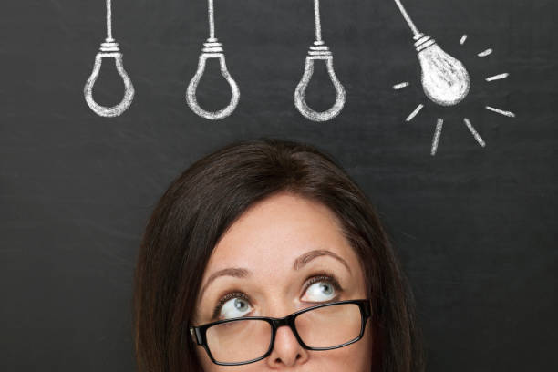 istock New Idea over woman Head 1182455534