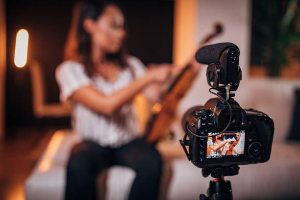 istock Violinist Woman Vlogging 1182455668