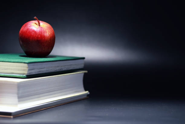 istock A stack of textbooks and books on the table. The concept of knowledge. 1182456962