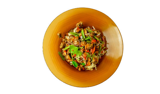 istock Cockle spicy salad with mango isolated on white background with clipping path 1182457041