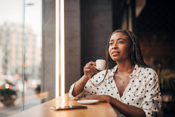 istock Woman  at the cafe 1182458235