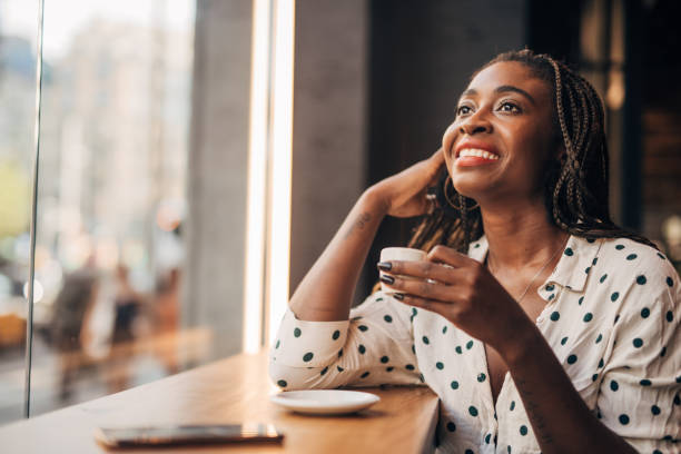 istock Young woman  at the cafe 1182458470