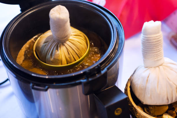 istock Heating thai herbal massage stamps 1182458735
