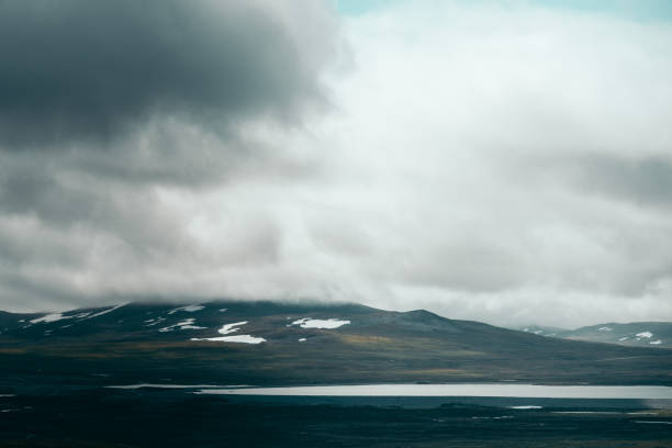 istock Mountains, cloudy sky, snow in the mountains 1182461603
