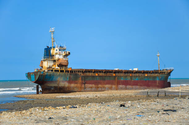 istock Taoyuan, Taiwan - MAR 30, 2019: Freighter stranded on the coast. 1182461844