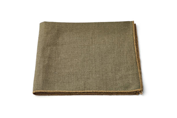 istock Green textile napkin on white background 1182463401
