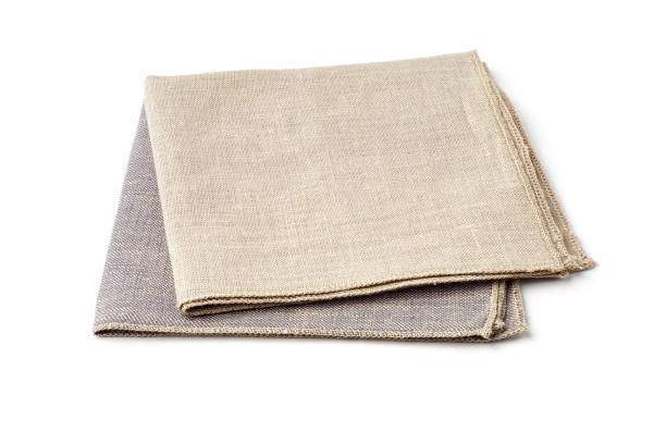 istock Beige and gray textile napkins on white background 1182464234