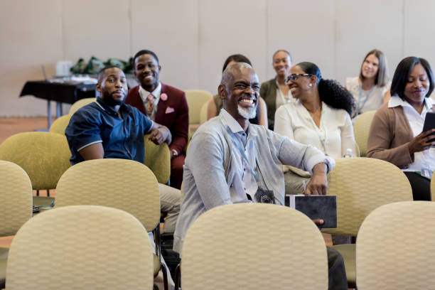 istock Happy businesspeople attending seminar 1182464434