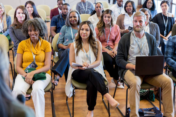 istock Businesspeople attending seminar 1182464477