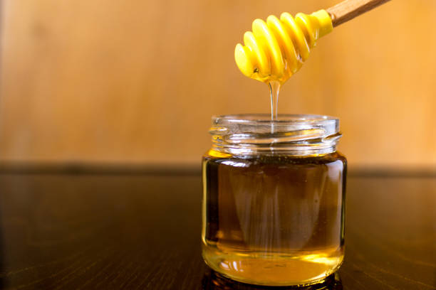 istock honey and linden flowers 1182464922