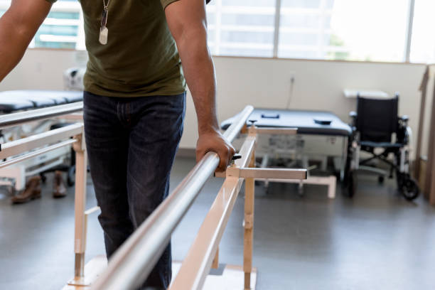 istock Unrecognizable male veteran does individual walking exercise 1182465097