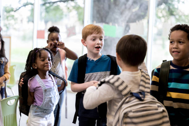 istock Little boys play together during kindergarten class 1182465167