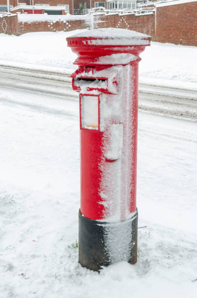 istock Red Mail Box In The Snow 1182466516