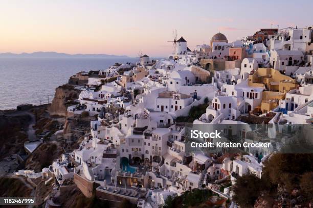 Oia Santorini At Sunset Stock Photo - Download Image Now - Aegean Sea, Architecture, Caldera