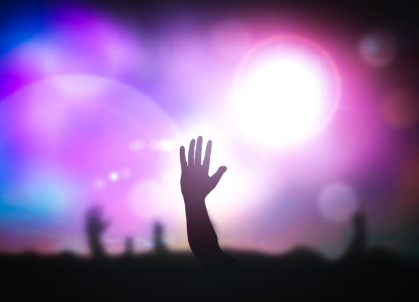 Good friday concept Human raised hands over blurred concert background gospel stock pictures, royalty-free photos & images