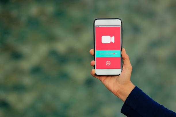 istock Video on mobile screen, video sharing and marketing 1182470546