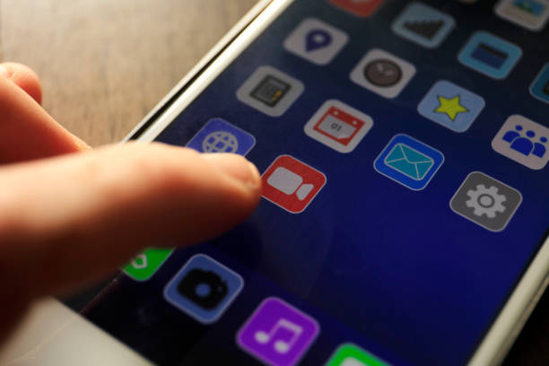 Video icon on mobile screen, video sharing and marketing