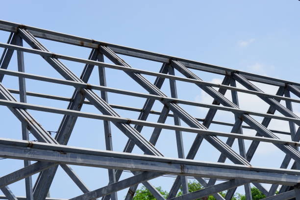 istock Structure of steel roof frame for building construction 1182472954