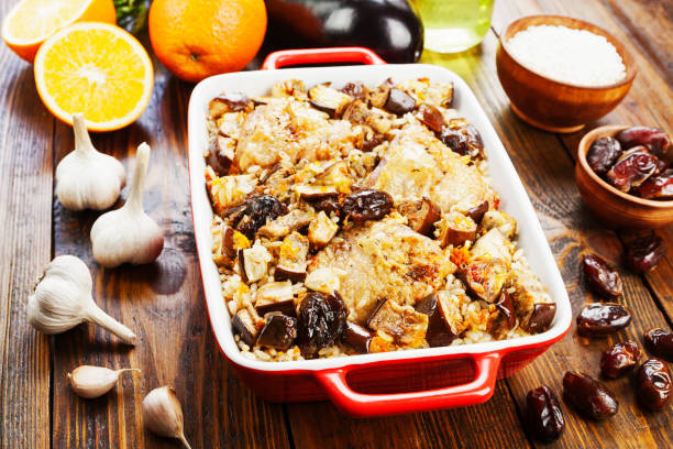 istock Chicken thigh baked with rice, eggplant and figs 1182473451