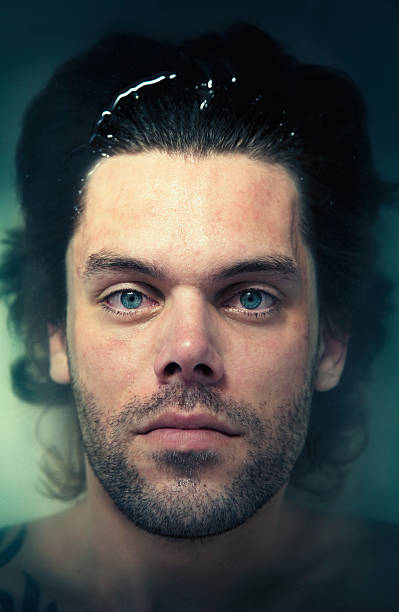 istock Cross Processed Portrait of Man in Water 118247467