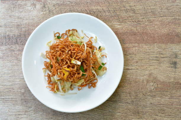 istock fried instant noodles with tofu and garlic chive 1182476023