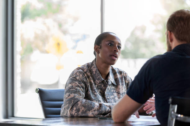 istock Female soldier seeks counseling 1182476071