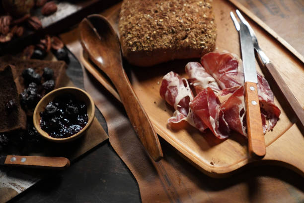 istock dried prunes, bacon, bread pastry bakery. baked food 1182476157