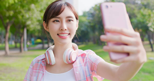 istock asian woman have video chat 1182476331