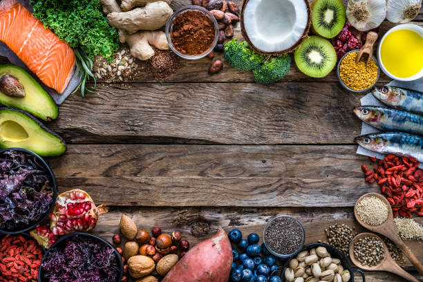 istock Healthy eating: selection of antioxidant group of food frame. Copy space 1182477424
