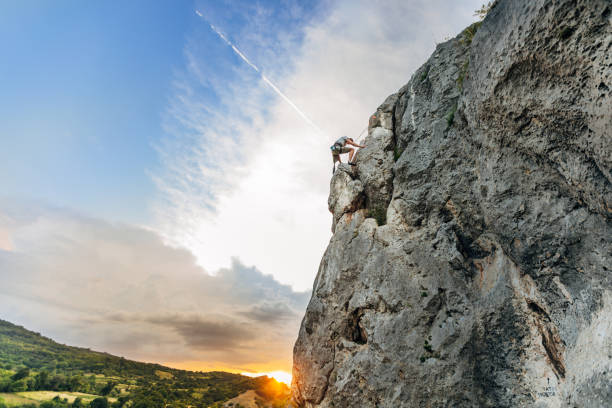 istock Disability young man free  climbing 1182477897