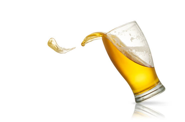 istock Beer splash in glass isolated on white 1182477973