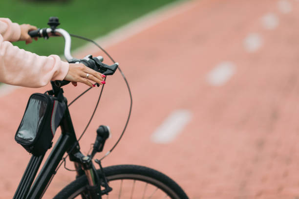 istock cyclist on a bike path on sunny day 1182477998