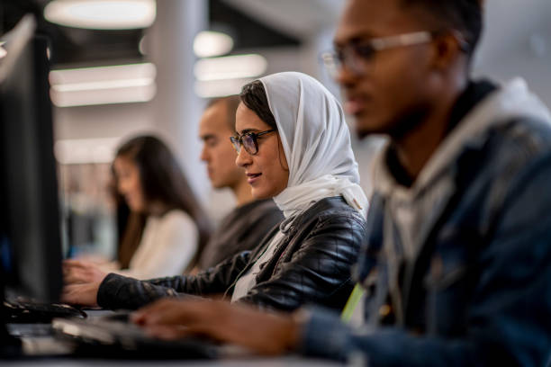 istock University Students Studying Online stock photo 1182479278