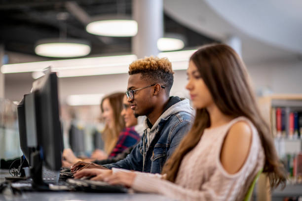 istock University Students Studying Online stock photo 1182479290