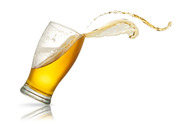 istock Beer splash in glass isolated on white 1182482742
