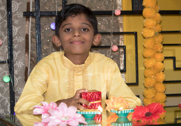 istock Boy celebrating Diwali festival 1182484103