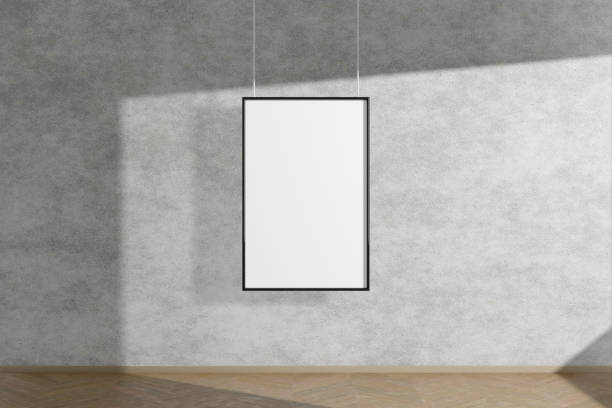 istock Vertical mock up picture frame in black hanging on concrete wall simple interior dark room light and shadow of the window. 3D rendering 1182485076