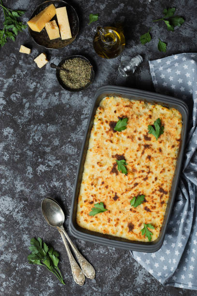 istock american Mac and cheese, pasta in cheesy sauce 1182485813