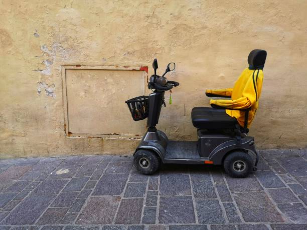 Empty electric wheelchair in the street