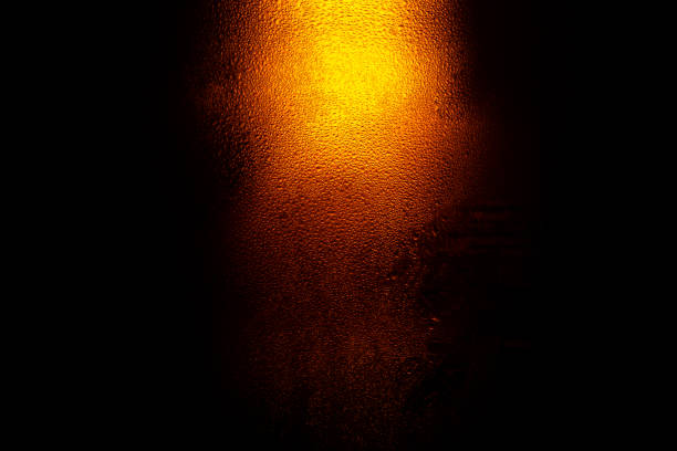istock Water drops background,Refreshing Brown Cold Beer Bottle Covered With Condensation,Macro Beer Bottle 1182487955