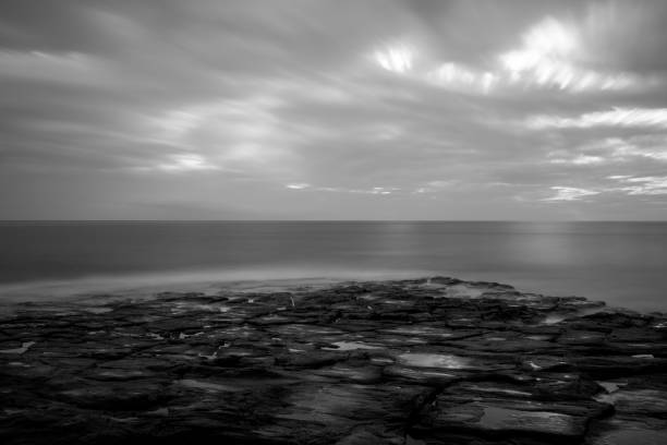 istock Dramatic seascape view in autumn season, black and white texture. 1182487989