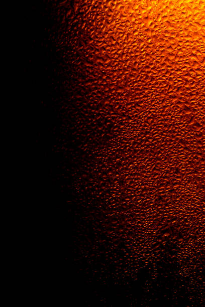 istock Water drops background,Refreshing Brown Cold Beer Bottle Covered With Condensation,Macro Beer Bottle 1182489880
